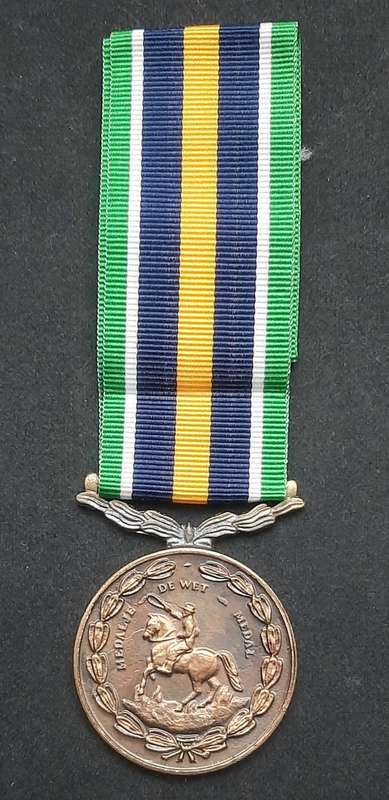 **Border War : 1980s SADF De Wet Medal w/ Ribbon  (Numbered).**
