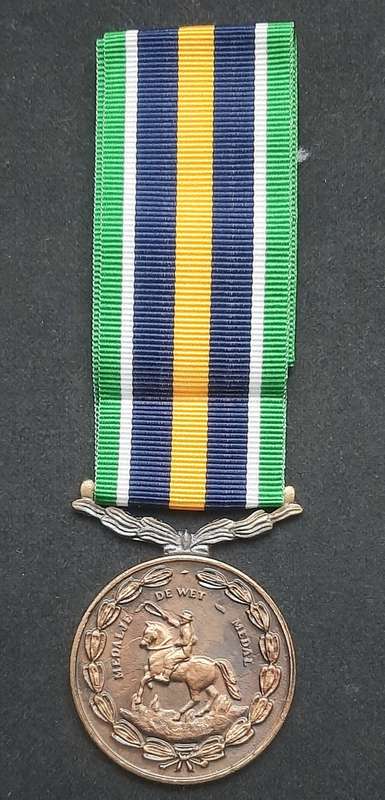 **Border War : 1980s SADF De Wet Medal w/ Ribbon  (Numbered).**
