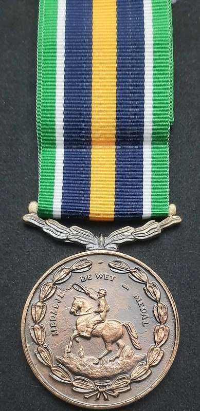 **Border War : 1980s SADF De Wet Medal w/ Ribbon  (Numbered).**