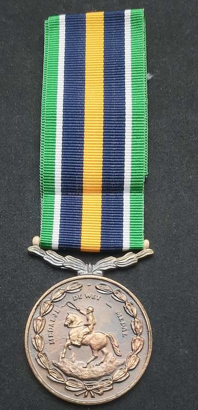 **Border War : 1980s SADF De Wet Medal w/ Ribbon  (Numbered).**