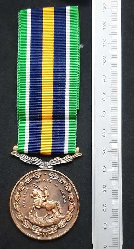 **Border War : 1980s SADF De Wet Medal w/ Ribbon  (Numbered).**