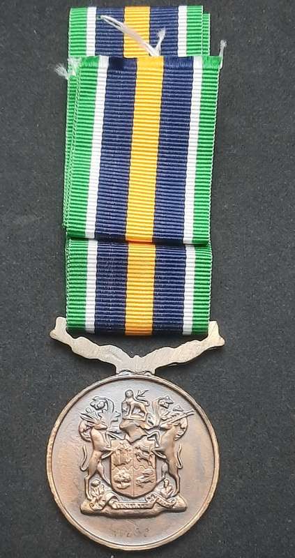**Border War : 1980s SADF De Wet Medal w/ Ribbon  (Numbered).**