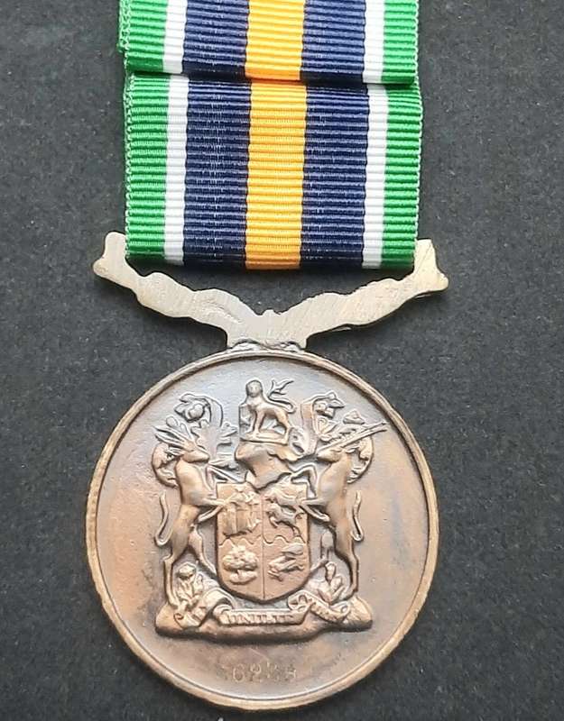 **Border War : 1980s SADF De Wet Medal w/ Ribbon  (Numbered).**