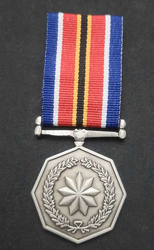 ** 2004 SANDF : General Service Medal w/ Ribbon (Numbered) .**