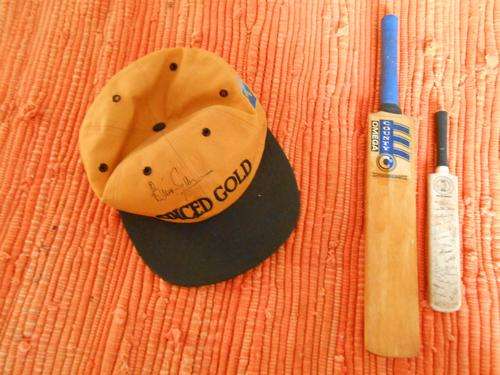BRIAN LARA SIGNED CAP WITH TWO CRICKET BATS