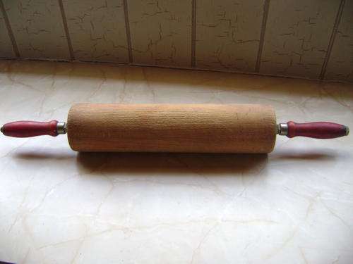 THIS OLD INDUSTRIAL DOUGH ROLLER IN GOOD CONDITION.