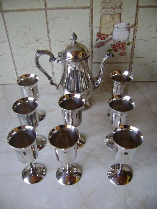 THIS SILVER PLATED KKETTLE AND 8X WINE GOBLETS - IN EXCELLENT CONDITION.