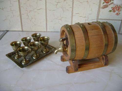 BRASS GOBLETS ON TRAY AND WINE BARRELL ON STAND