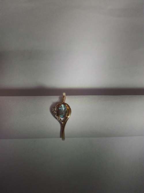 9ct yellow gold with blue oval stone, excluding shipping