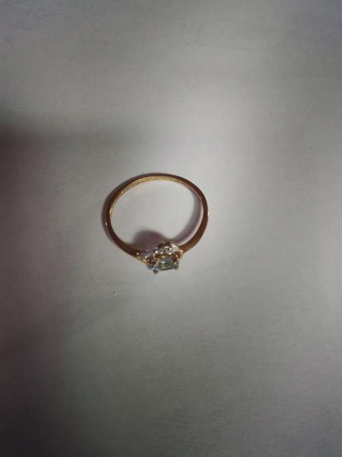 9ct yellow gold with blue oval stone, excluding shipping