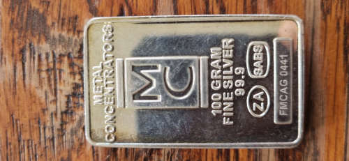 MC 100 gram 999 silver bar - tarnish marks