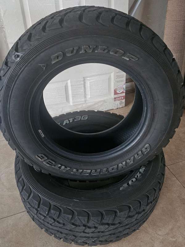 Dunlop GRANDFREK AT 3G Multi-terrain Bakkie Tyres. Size 265/65 R17. Thread over 95% minor patch