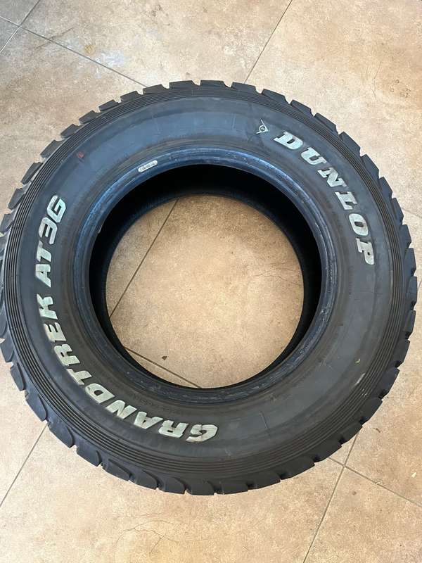 Dunlop GRANDFREK AT 3G Multi-terrain Bakkie Tyres. Size 265/65 R17. Thread over 95% minor patch