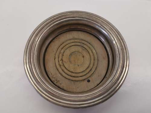 FIVE VICTORIAN SILVERPLATE BOTTLE COASTERS
