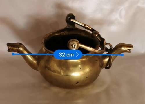 A 16TH CENTURY FLEMISH LEADED BRONZE TWIN-SPOUTED LAVABO, the 16th century way to wash ones hands