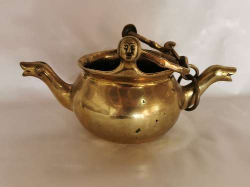A 16TH CENTURY FLEMISH LEADED BRONZE TWIN-SPOUTED LAVABO, the 16th century way to wash ones hands
