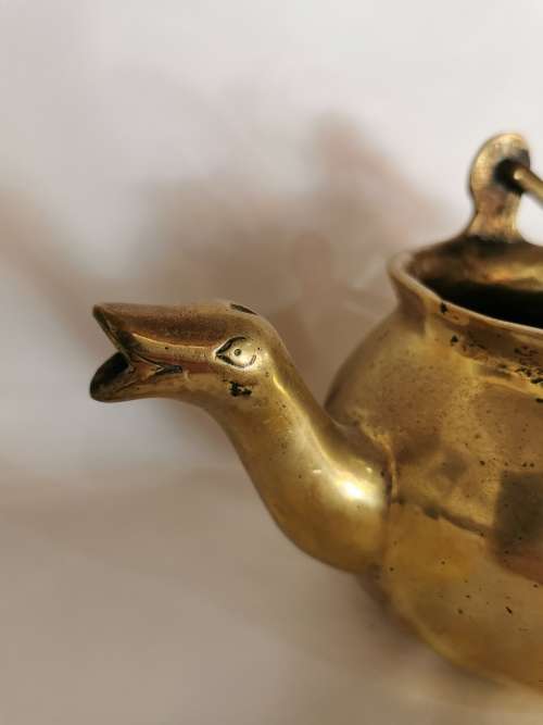 A 16TH CENTURY FLEMISH LEADED BRONZE TWIN-SPOUTED LAVABO, the 16th century way to wash ones hands