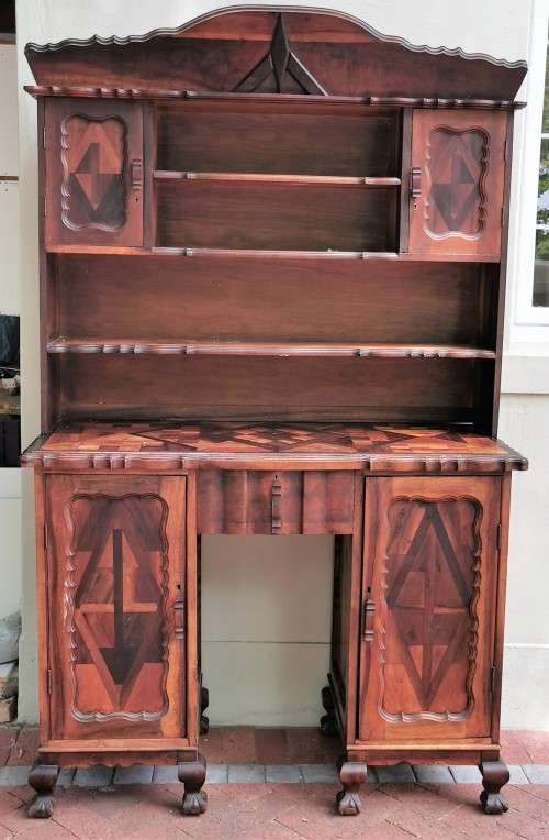 A STUNNING ORIGINAL STINKWOOD AND YELLOW WOOD AFRIKANA WELSH DRESSER