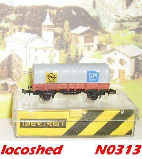 Goods Wagon low sided tarped (GM+OPEL) 2-axle/65mm, boxed, top condition, N0313 Ibertren