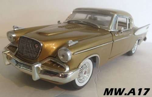 Studebaker Golden Hawk 1957 gold+white 1/18 pre-owned, original box, superb condition!
