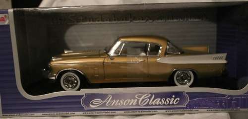 Studebaker Golden Hawk 1957 gold+white 1/18 pre-owned, original box, superb condition!