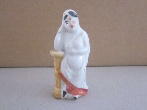 Asian porcelain doll