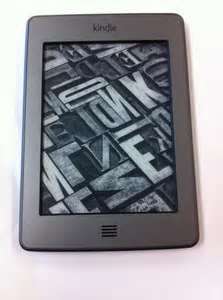 KINDLE AMAZON MODEL D01200 WITH CHARGER