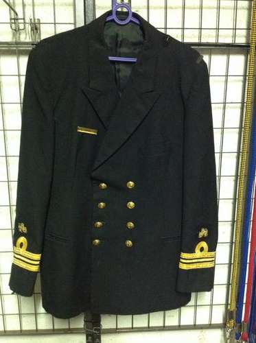 Navy tunic with insignia