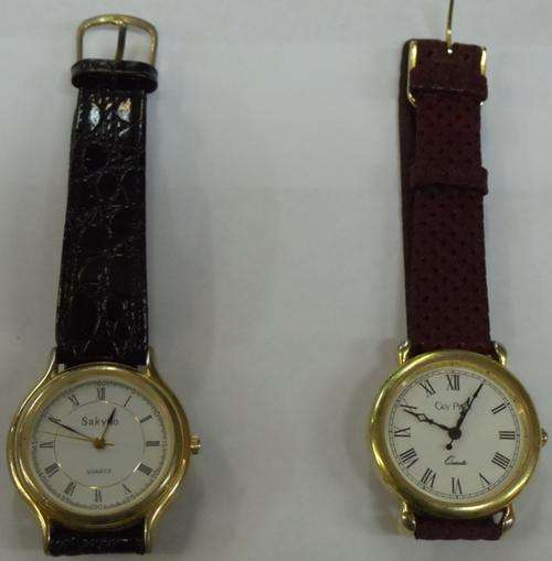 USED SET OF COLLECTOR EDITIONS - GUY PINOT AND SAKYNO - LEATHER STRAPS