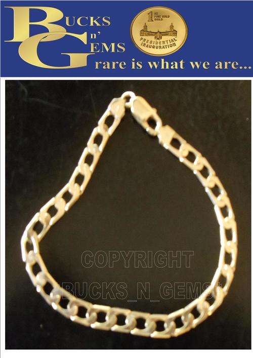 9CT GOLD BRACELET - STAMPED 9CT 375 - 11.5 GRAMS PURE GOLD - 23CM LONG 7mm WIDE