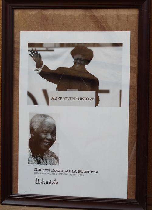 MANDELA SIGNED COPY BLACK AND WHITE POVERTY POSTER - SIGNED BY MANDELA + comm. coins set