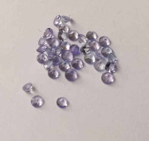 1.105cts TANZANITE - ROUND CUT - EXCELLENT TOP COLOR - 36 STONES 0.035 POINTERS