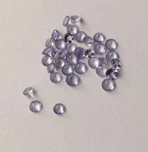 1.105cts TANZANITE - ROUND CUT - EXCELLENT TOP COLOR - 36 STONES 0.035 POINTERS