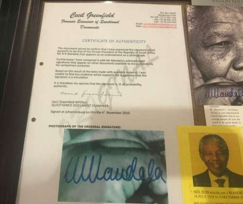 SIGNED - MANDELA PHOTOGRAPH SIGNED IN INK + CERTIFICATE BY CECIL GREENFIELDS INCLUDED + R5 COIN SET