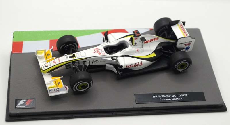 Brawn GP 01 as driven by Jenson Button in 2009 with magazine