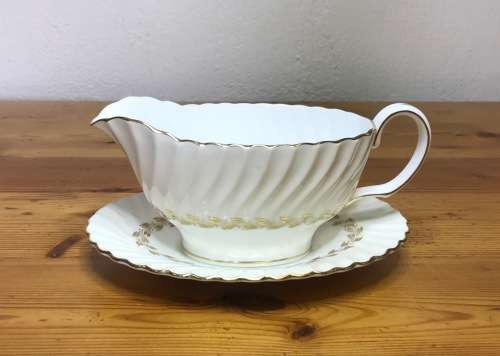 MINTON GRAVY BOAT and SAUCER GOLD CHEVIOT PATTERN RARE Very good condition.