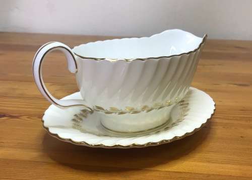 MINTON GRAVY BOAT and SAUCER GOLD CHEVIOT PATTERN RARE Very good condition.