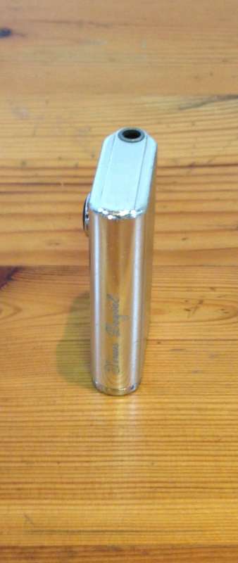 LIGHTER=WIN=Battery Electric Cigarette Lighter=BUTANE=SMOKING=SILVER COLOURED.