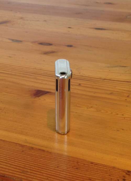 LIGHTER=WIN=Battery Electric Cigarette Lighter=BUTANE=SMOKING=SILVER COLOURED.