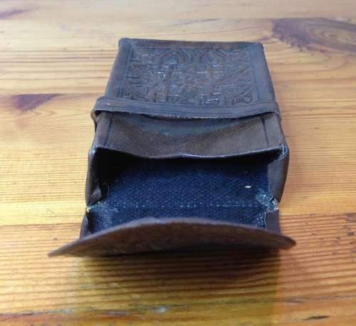 CIGARETTE BOX HOLDER=LEATHER=EMBOSSED=SOLD AS SEEN IN THE IMAGES.