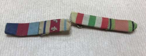 MILITARY RIBBON INSIGNIA DECORATIONS??