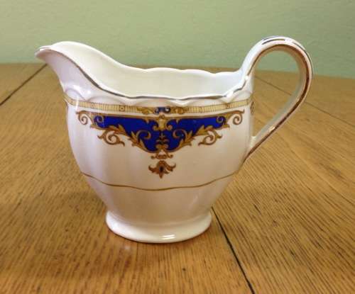 GRINDLEY TEA=JANIQUE PATTERN=MILK/CREAMER=SUGAR=5 TRIOS=17 pieces=1954 on.