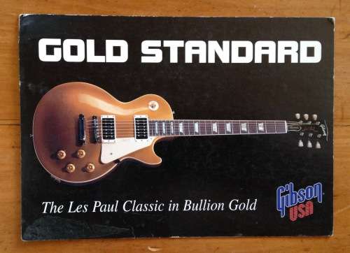 POSTCARD POST CARD GIBSON GUITARS GOLD STANDARD THE LES PAUL CLASSIC IN BULLION GOLD 90`s REPLICA.
