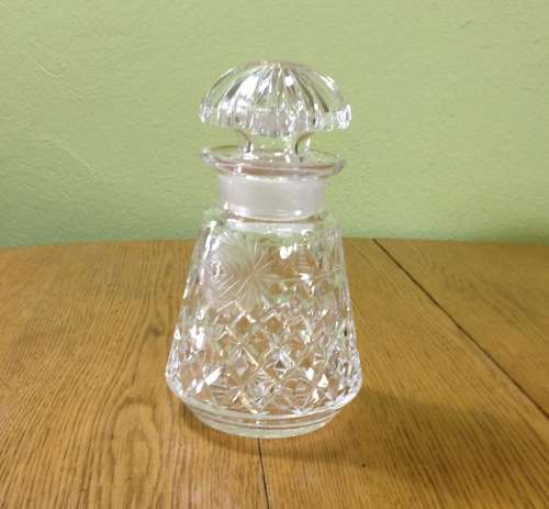 DECANTER=CUT GLASS DECANTER=TAPERED ROUND=EXCELLENT CONDITION=ROSE PATTERN ENGRAVING.