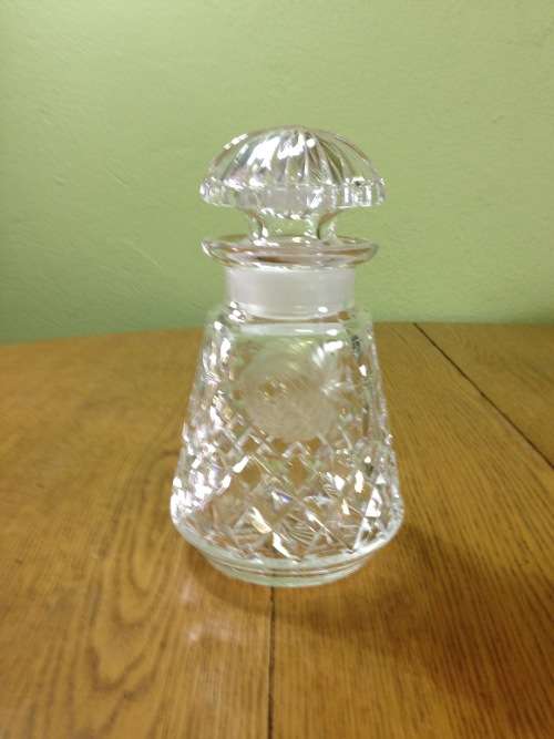 DECANTER=CUT GLASS DECANTER=TAPERED ROUND=EXCELLENT CONDITION=ROSE PATTERN ENGRAVING.