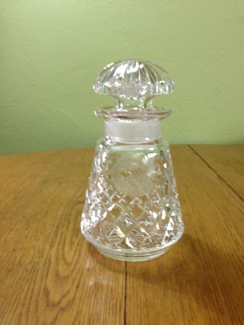 DECANTER=CUT GLASS DECANTER=TAPERED ROUND=EXCELLENT CONDITION=ROSE PATTERN ENGRAVING.