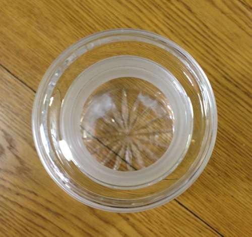 DECANTER=CUT GLASS DECANTER=TAPERED ROUND=EXCELLENT CONDITION=ROSE PATTERN ENGRAVING.