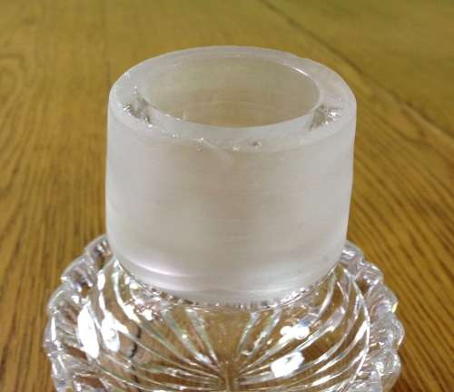 DECANTER=CUT GLASS DECANTER=TAPERED ROUND=EXCELLENT CONDITION=ROSE PATTERN ENGRAVING.