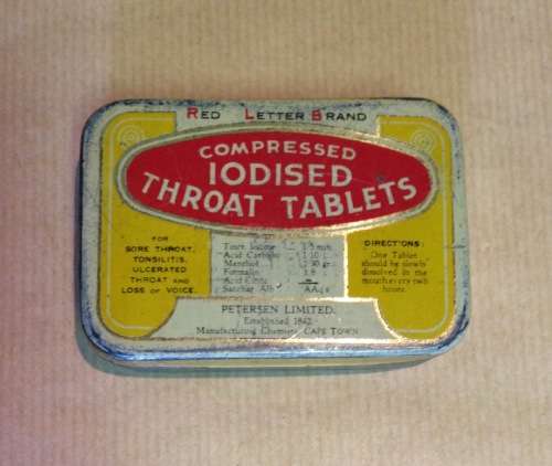 COMPRESSED IODISED THROAT TABLETS TIN RED LETTER BRAND PETERSEN LIMITED CAPE TOWN CHEMISTS.