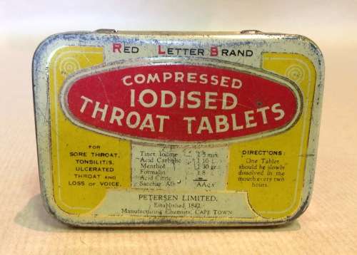 COMPRESSED IODISED THROAT TABLETS TIN RED LETTER BRAND PETERSEN LIMITED CAPE TOWN CHEMISTS.